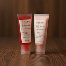 Load image into Gallery viewer, Sweet Strawberries Body Wash and Lotion sample duo on dark woodgrain background
